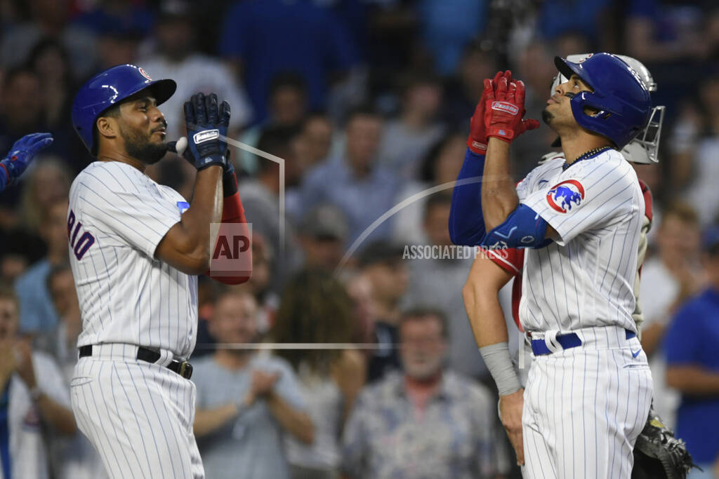 Christopher Morel of the Chicago Cubs hits a two run home run in