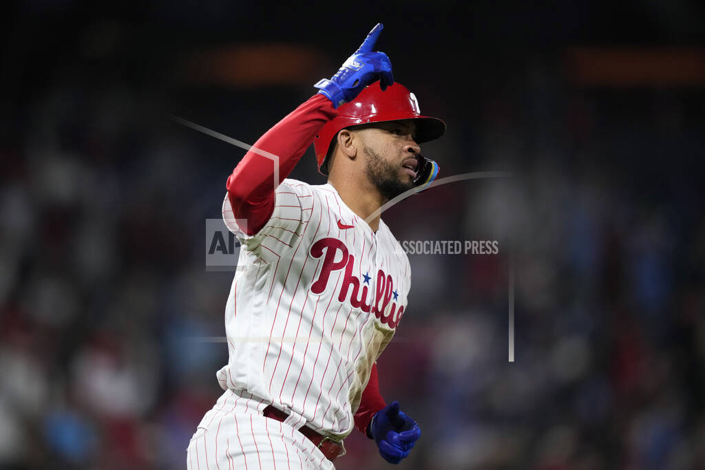 Edmundo Sosa of the Philadelphia Phillies reacts after hitting an