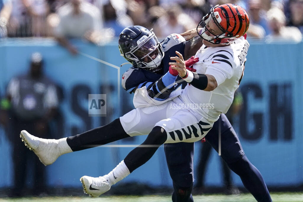 Henry runs for TD, throws for score as Titans rout Burrow, Bengals 27-3 -  Record Herald