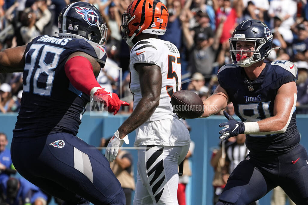 Henry runs for TD, throws for score as Titans rout Burrow, Bengals 27-3 -  Record Herald